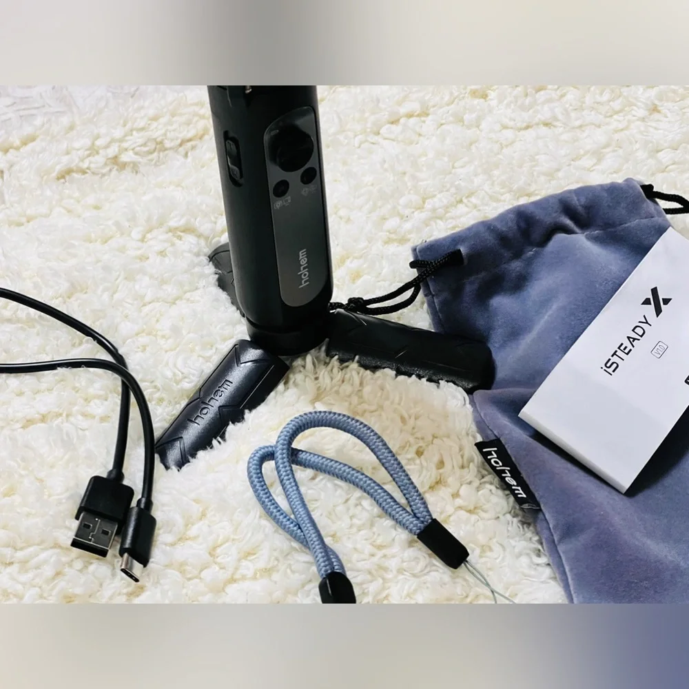 Hohem iSTEADY Gimbal v1.0 (Phone Tri-pod). Used a few times. LIKE Brand NEW